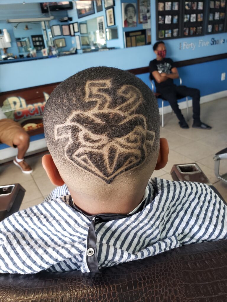Bald Fade with team logo design