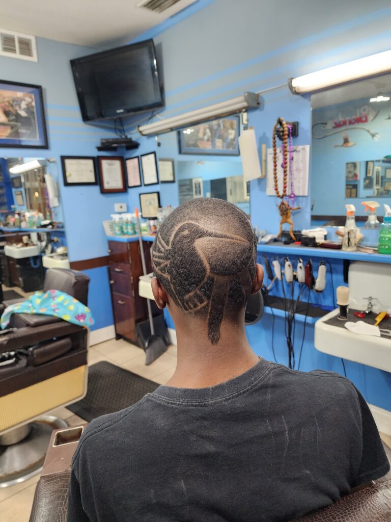 Temple Taper with Sun Bird design