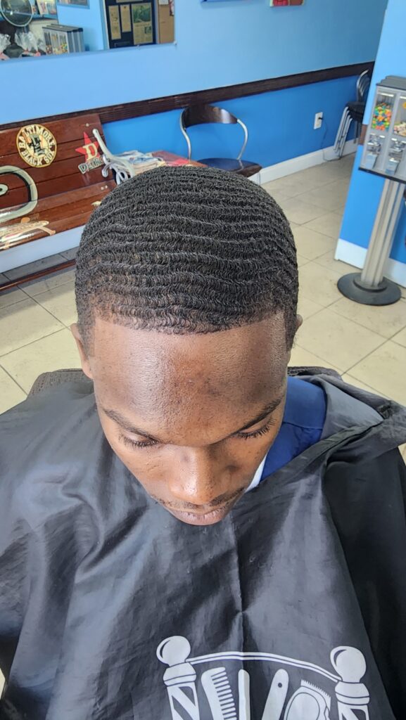 Bald fade with high top & part